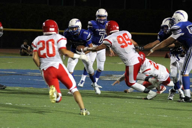 Fillmore Flashes battled tough against Port Hueneme during last Fridays game. Angel Velez had a 97 yard kick-off return for a touchdown early on in the game. David Vargas had 7 solo tackles on defense. Aries Vega rushed for 107 yards. However, Varsity fell short in the second half leaving the score Flashes-20 to Hueneme-46.”We had a great first half of football, but too many mistakes in the second half.”-Head Coach M. Dollar. The varsity team is hoping to make up for these mistakes when they battle against our town’s long-time rival Santa Paula Cardinals in their 106th meeting. The game will take place Friday September 16, 2016 at 7:30PM. Photos by Crystal Gurrola.