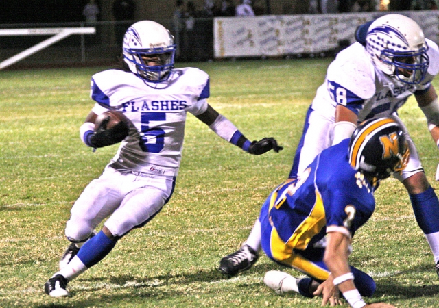 Troy Hayes #5 goes around the outside for yardage against Nordoff; Fillmore lost 42-7. (Football photos courtesy of Crystal Gurrola)