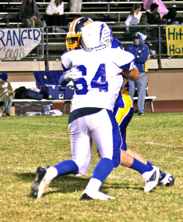 Jose “Froggy” Estrada makes one of his many tackles of the game.