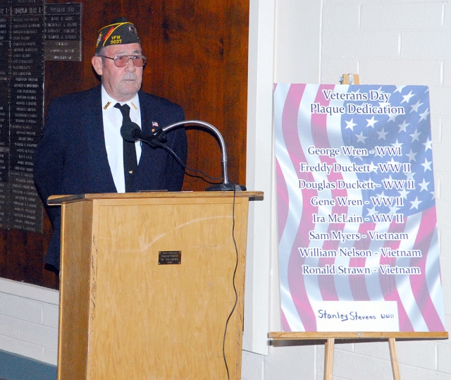 VFW Post 9637 Commander Jim Rogers stands by a display of Veteran’s name to be added to a bronze plaque which is display at the Fillmore Veteran’s Memorial Building: George Wren, WWI; Gene Wren, WWII; Stanley Stevens, WWII; Ira McLain, WWII; Freddy Duckett, WWII; Douglas Duckett, WWII; Sam Myers, Vietnam; Ronald Strawn, Vietnam; and William Nelson, Vietnam.