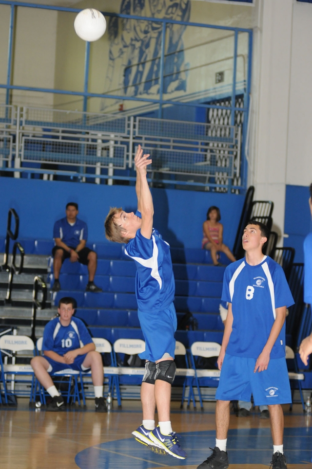 Micah Chumley (left) and Saul Lopez (not pictured) contributed 5 kills and 12 assists against Oaks Christian. Also pictured is Jorge Ruiz.