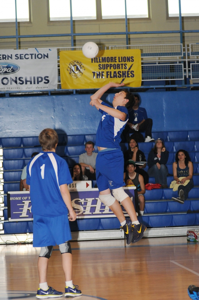 On Thursday, March 29, the FIllmore Flashes played against Oaks Christian. Fillmore lost in 3 games but played well against the agressive team. (Above) James Farr #5 hits the ball over the net.