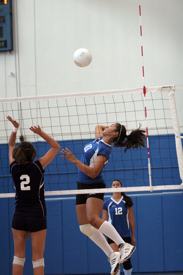 Tory Ayala spikes the ball, getting it past the defense. Fillmore lost to Frazier Mountain.