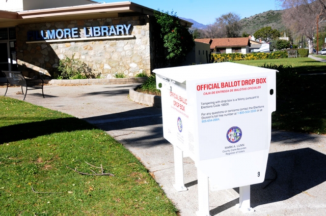 This past weekend an Official Ballot Drop Box was installed in front of the Fillmore Library on the corner of Second Street and Central Avenue. Written on the side of the box “Tampering with drop box is a felony pursuant to Elections Code 18500. For any questions or concerns contact the Elections Division’s toll free at 1-800-500-3555 or at 805-654-2664.” Be sure to cast your ballots for this year’s election. 