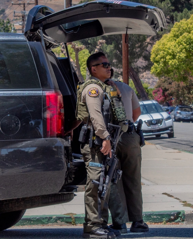 On Sunday, July 10th, 2022, at 12:30pm, Ventura County Sheriff’s Deputies, along with K-9 unit and Sheriff ’s copter, were seen in the area of Sespe Avenue and Mountain View Street, Fillmore. According to radio traffic a male subject was seen carrying a rifle. Sheriff ’s Deputies set up a perimeter where the subject was reported last seen. At approximately 2:00pm, Sheriff’s Deputies cleared the scene with no subject located, and no further reports. Photo credit Angel Esquivel-AE News.