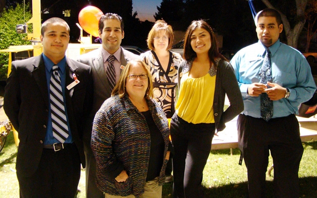 The four elementary schools in Fillmore and Piru wish to thank Wells Fargo for sponsoring their Fall Harvest Festival/Carnival. It was a huge success and a favorite community event. Pictured here (Starting left) are: Abram Zetina, Billy Ramirez (Branch Manager of Fillmore Wells Fargo), Sally Horn, Ingrid Munoz and Jose Ruiz. In front is San Cayetano Principal, Jan Marholin. Pictured Wells Fargo employees donated their time to work at the carnival.