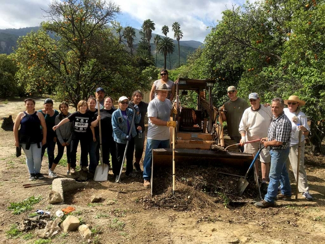 Work Day, at Rancho Camulos, included Rotary members, family, 4-H and Interact students. The group cut dead branches out of trees, raked all area under the trees, hoed weeds, hauled rocks away. Andy Klittich brought a tractor and was able to move extra Adobe bricks, spread pile of sand level much of the small orchard. The small Adobe will be opened to the public on May 7.