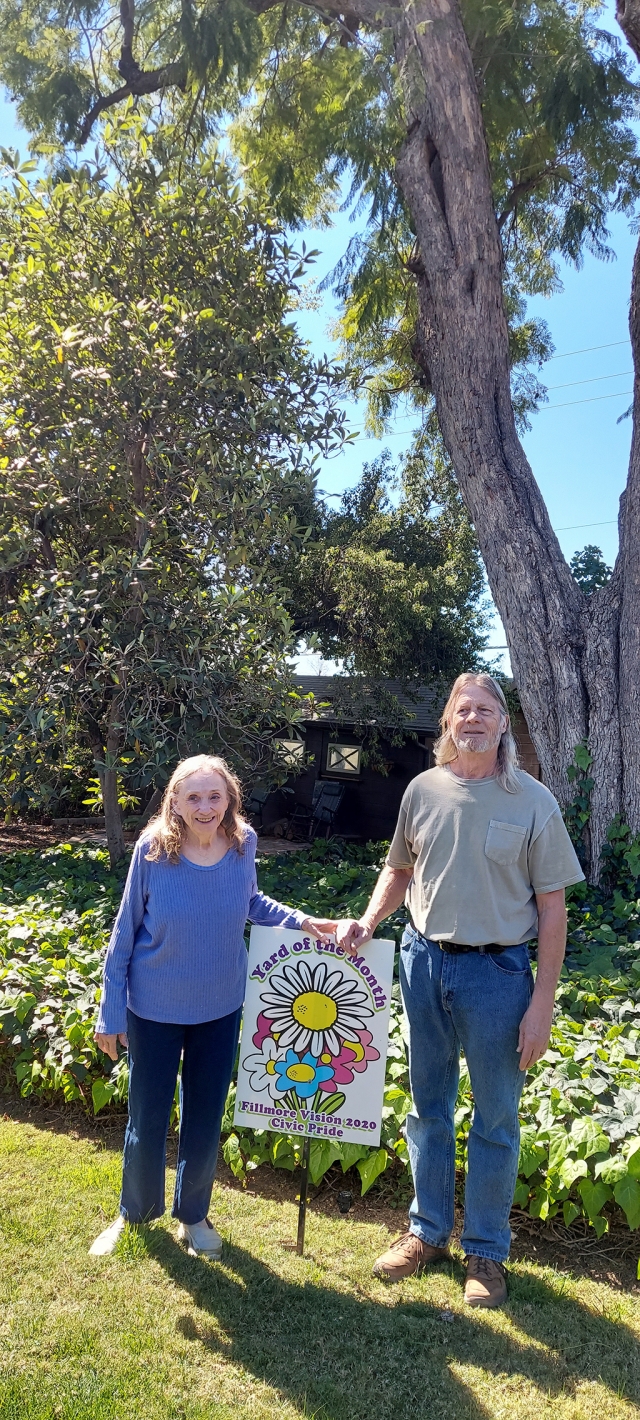 (l-r) Norma and Larry Holt outside their home which was name Fillmore Vision 2020 Civic Pride’s March Yard of the Month, at the corner of Mountain View and Fourth Street in Fillmore. Photo credit Fillmore Civic Pride Committee.