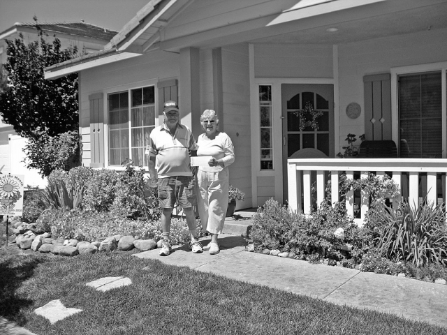 Hank and Mary Weyand of 908 Hinckley, Fillmore, were awarded Yard of the Month for July 2009. The Weyand’s have landscaped their front yard with colorful plantings of day lilies, iris, snapdragons, nasturtiums, lavender and roses. Their front porch is shaded by a large Schefflera as well as a Mimosa tree. The Yard of the Month award is issued by Civic Pride 2020 and includes a donated Otto and Sons $25 gift certificate.
