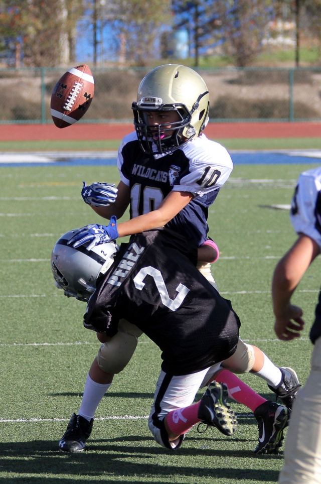 Raiders Bantam Black #2 Makes the tackle and causes a fumble. Photos courtesy Crystal Gurrola.