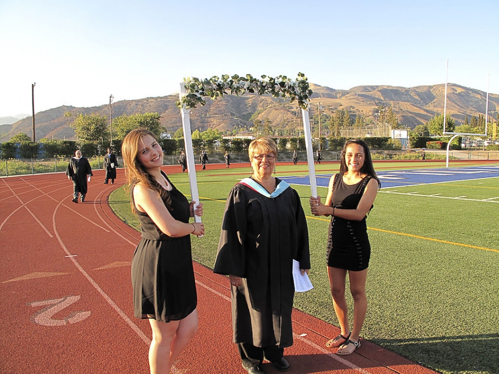 Last Thursday, June 13th, Fillmore High School graduated over 230 students. It started out with the traditional bus ride to the ceremony and the entrance into the stadium under the arches, with the stands full of family and friends. There were 15 Valedictorians and 1 Salutatorian. Senior Class President Kaylee Hinklin gave her speech “Just Ordinary People”, which was followed by FHS Teacher Josh Overton’s “We are all Survivors”, and Valedictorian Jose Contreras’ “Born from the Ashes and Rubble”. Photos courtesy of KSSP Photographic Studio.