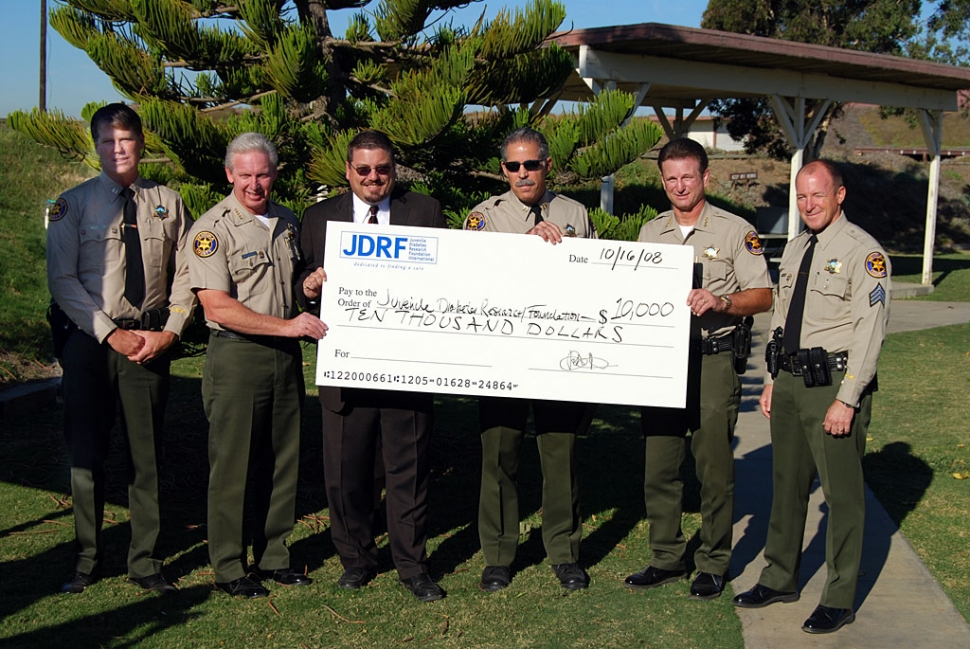 Shown (l-r) are Captain Tim Hagel, Sheriff Bob Brooks, JDRF Official Captain Randy Pentis, Undersheriff Craig Husband, and Sergeant Joe Devorick.