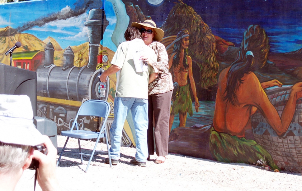Supervisor Kathy Long introduces and greets mural artist Carlos Callejo