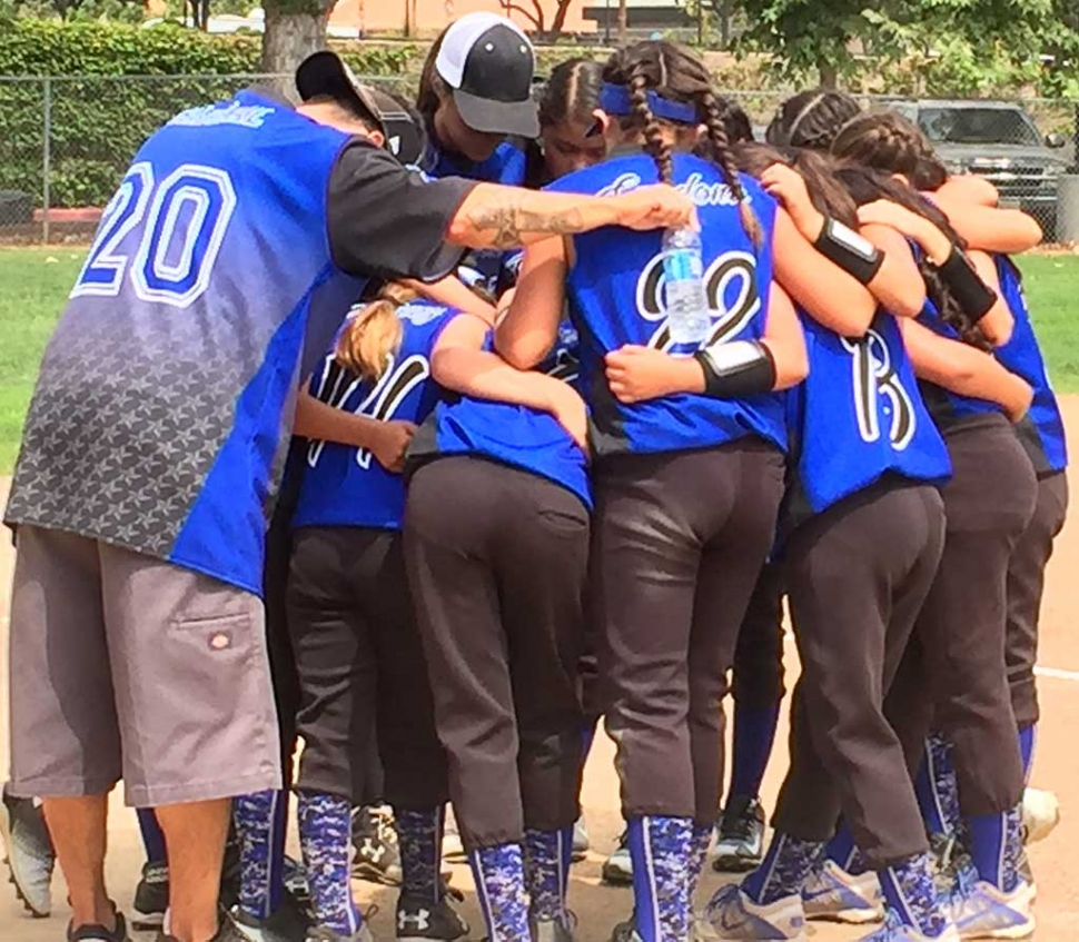 Fillmore’s team huddles before they kick off the C Regional Championship in San Diego against Sylmar. Photo courtesy Cesar Camacho.