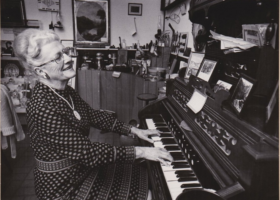 Pictured above is Edith Moore Jarrett at the organ, circa 1977. In 1971 Edith announced the new Fillmore Historical Museum had been created and was looking for items of historical significance. Inset, the front page of the Estey Organ Catalog, 1886. Photo credit Fillmore Historical Museum. 