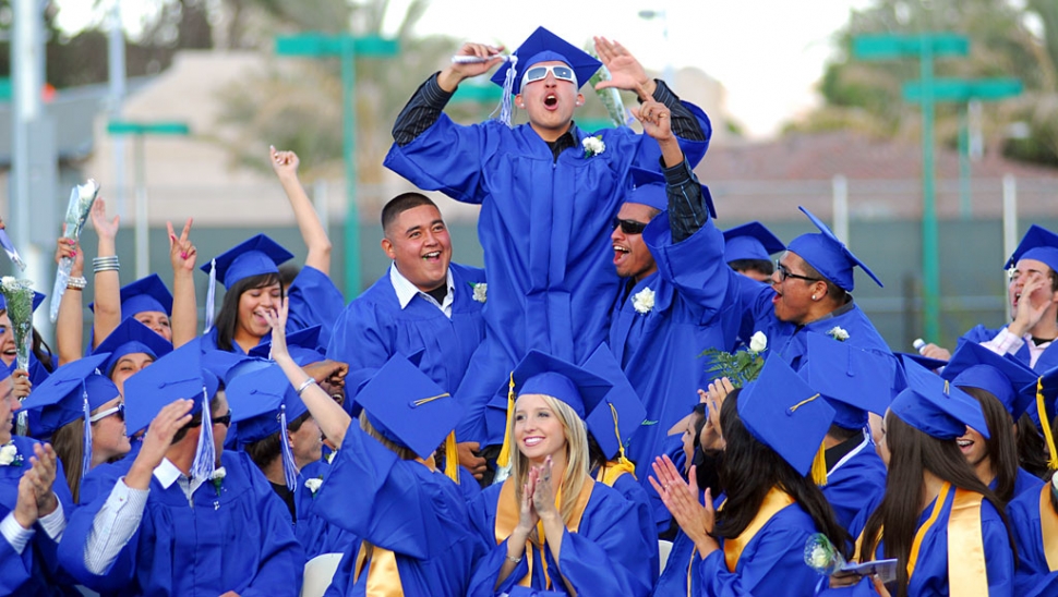 Thursday, June 4, Fillmore High School not only celebrated the Class of 2009 graduation, but also celebrated Sergio Cornejo’s (above) 18th Birthday. Cornejo is being held up by his classmates Vinny Sanchez and Jesse Sanchez. The class of 2009 had over 275 graduate this year. The class also had 29 CSF Life Members, 24 Golden State Merit Diploma, 1 Salutatorian, and 20 Valedictorians. 

Last Thursday the Class of 2009 held their commencment ceremonies. With over 275 graduating, the stadium was packed and overflowing onto the field. The event started off with the traditional Junior Archbear’s walking out onto the field as the graduating class walked underneath the arches. The band played “The Star Spangled Banner”, Jillian Wilber, ASB President, lead with the “Pledge of Allegiance”, Perry West, Senior Class President, gave his personal message “Not Holding Back”, followed by Matt Dollar, FHS Teacher of the Year, “I Wish You Enough”, and ending the personal messages, Brina Suttle, Valedictorian, with “What Lies Beneath”. There were many honored for their academic accomplishments, as follows: CSF Life members: Elizabeth Amezcua, Maria Arreola, Jessica Avila, Patricia Ciseneros, Meghan Cobos, Jessica Cornelius, Jonathan Escamilla, Vincent Ferguson, Yessica Flores, Taylor Gaitan, Danielle Gangl, Alexandra Garcia, Brandon Hunt, Jessica Leon, Antonio Magana, Maricarmen Magana, Stephanie Martinez, Jonathon Monroe, Andreina Montelongo, America Munoz, Miguel Ochoa, Bailey Pina, Mayra Regalado, Andy Reynaga, Erica Rodriguez, Nicole Sanchez, Erik Storey, Katy Talon, Carlos Tarango, Samone Vega. Golden State Merit Diploma: Noah Aguirre, Taylor Atkins, Alani Barajas, Ryder Bush, Jessica Cornelius, Jonathan Escamilla, Vincent Ferguson, Joshua Gaither, Kyla Hernandez,
Brandon Hunt, Rachel Kamradt, Emily Largey, Nathan Liu, Sierra Mangus, Gabriel Manzano, Vaneesa Rodriguez, Julianne Sandoval, Jose Sillas, Brina Suttle, Juan Carlos Toledo, David Watson, Michael Watson, Jacob Zellmer. Salutatorian Stephanie Bolanos. Valedictorians: Jazmyne Alvary, Taylor Atkins, Christina Bahena,
Alani Barajas, Karli Chessani, Natalie Garnica, Jaymee Harter, Kyla Hernandez, Rebeca Herrera, Aimee Orozco, Ryan Rivera, Julianne Sandoval, Franziska Scheifler, Brina Suttle, Juan Carlos Toledo, David Watson, Michael Watson, Jillian Wilber, Jacob Zellmer. Congratulations Class of 2009. We wish you the best!