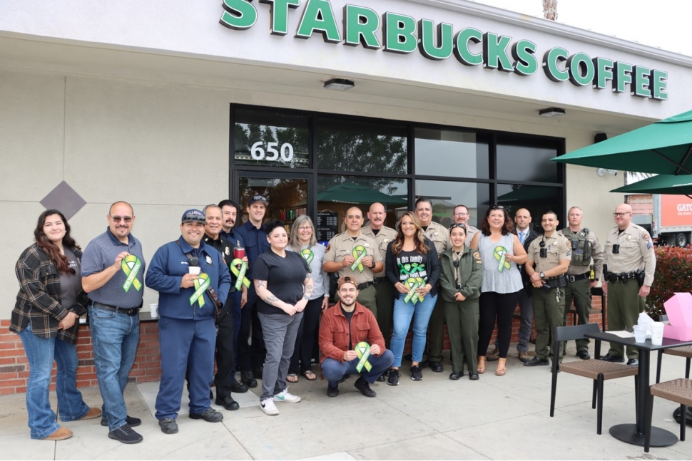 On Tuesday, May 16, the Fillmore Police and Fire Departments held “Coffee with the
Badges” in support of the First Responders for Mental Health Awareness Initiative. From
8am to 10am at Starbucks in Fillmore they enjoyed their coffee while they mingled with
the residents in an effort to build better relationships with the Fillmore community. Photo
credit Angel Esquivel-AE News.