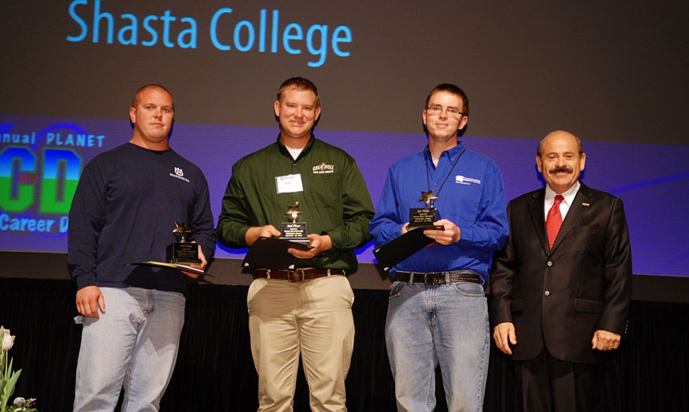 Andy Klittich (second from the left – wearing a green shirt) with the 1st & 3rd place winners and President of PLANET Gerald Grossi (Far right) at the Professional Landcare Network’s Student Career Days. Photo by Professional Landcare Network.