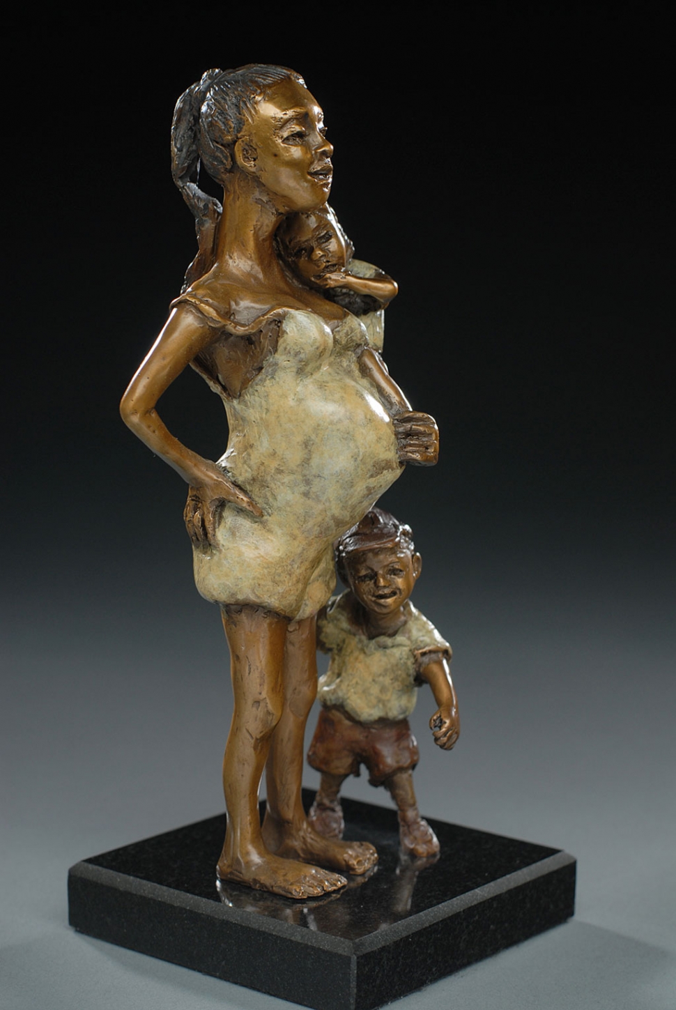 “Answering the Door” bronze by Susan R. Kaufman.