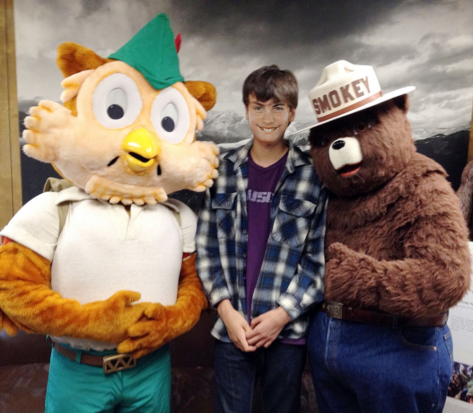 Diego Rodrigues with Woodsy Owl and Smokey the Bear at the "Get the Green" video and photo competition awards presentation.