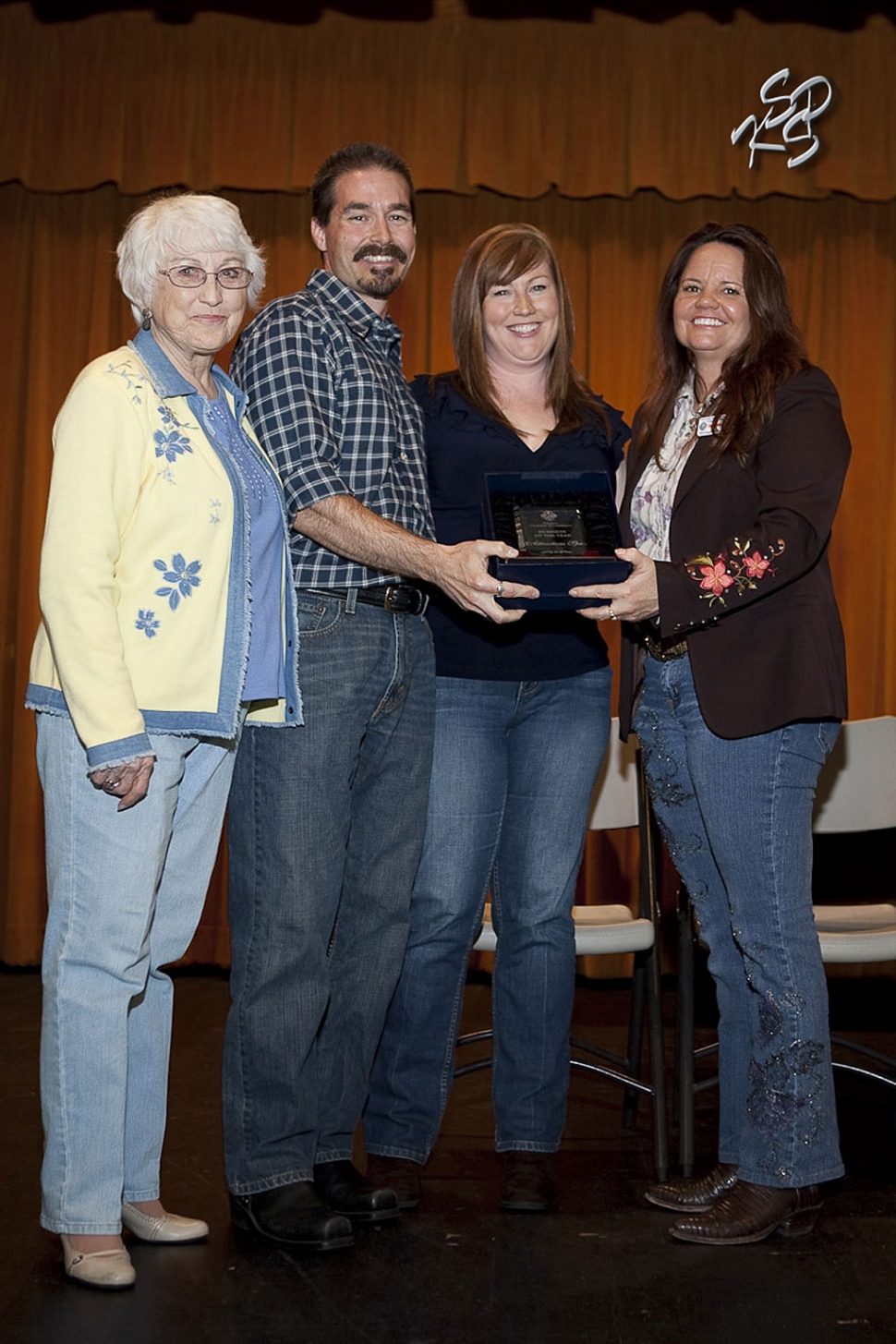 Thursday night at the The Community Awards dinner Attractions Spa was presented “The Business of the Year” award. It was presented by April and Sean Hastings (center), grandmother Mary Tipps (left). Also pictured is Cindy Jackson. Community Awards dinner photos courtesy of KSSP Photographic Studios.
