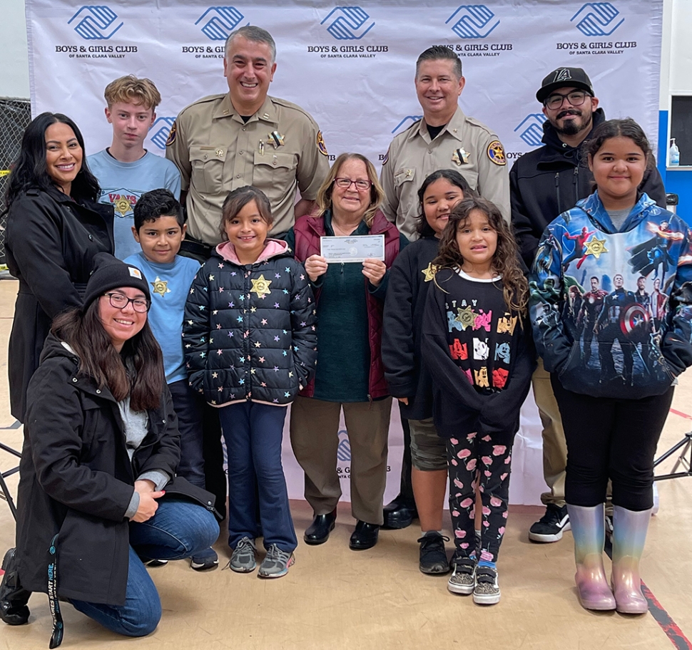 On Thursday, January 5th, Commander Jeff Miller and Fillmore Police Chief Garo Kuredjian presented a check for $20,000 to Jan Marholin, CEO of the Santa Clara Valley Boys & Girls Club, on behalf of the Ventura County Sheriff’s Department. Pictured are staff and young members of the Santa Paula clubhouse. The funds will be used to continue to support their youth mentoring program. Photo credit Boys & Girls Club of SCV.