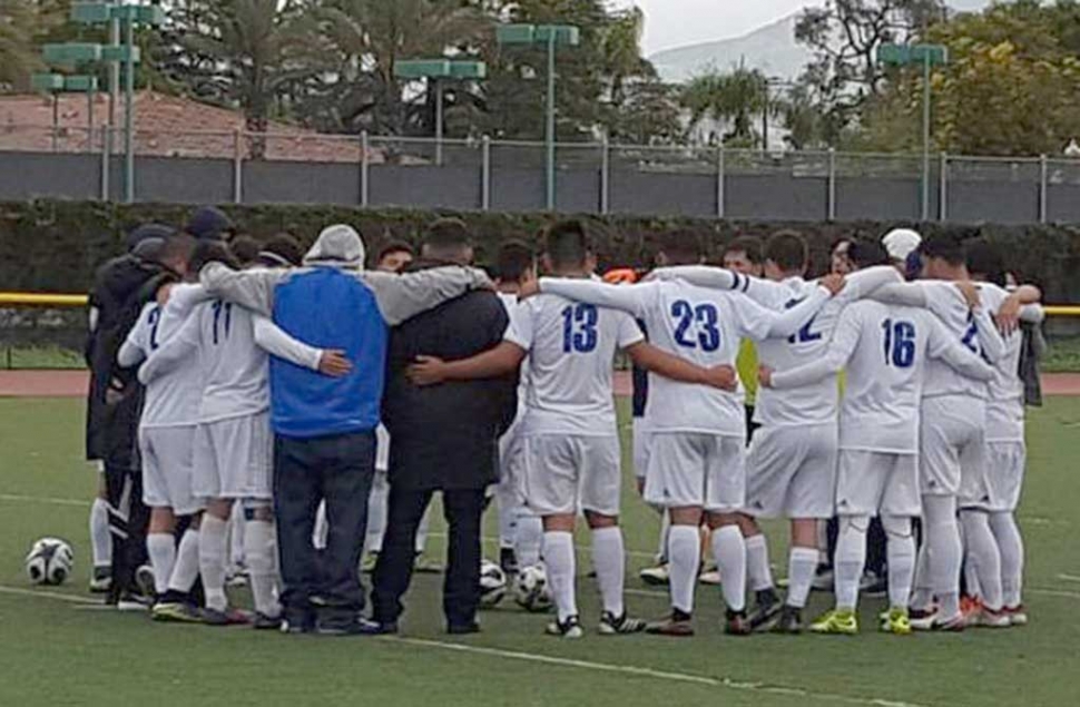 (above) The team huddles together before they get the first round of playoffs started as the compete against Windward High School. The boys played Winward High on Saturday and won 1-0 in overtime goal by Ruben Rodriguez off a Penalty kick. February 22, the boys traveled to San Clemente to play vs. St. Margarets school and won 1-0 to advance to quarter finals this Saturday the 25th @ 5pm in Fillmore.