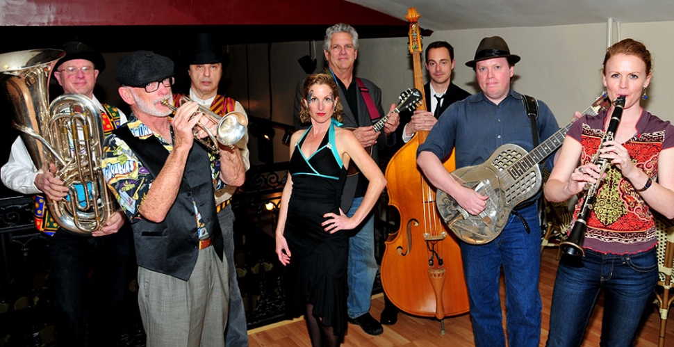 The Barrelhouse Wailers: Karen Parkhouse (Vocals), Wayne Philipp (Guitar & Banjo), Curt Ingram (Cornet), David Leoncavallo (Bass), Diamono Andreo (Drums), Jim Wade (Tuba), and Alethea Lamb (Clarinet).
