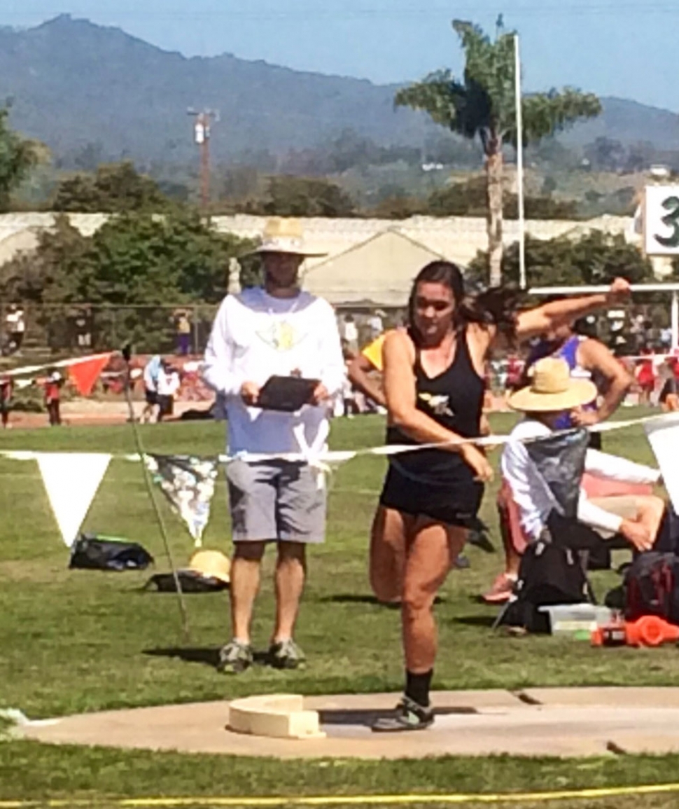 Kayla Grove throwing shot put, placing 7th in D4