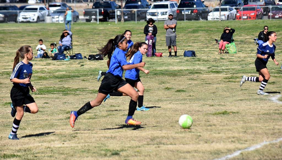 California United’s Marlene Gonzales leads the attack versus Oxnard National with teammates Kari Terrazas and Jessica Rodrigues running the wing during this past Saturday’s game. Photo Courtesy Martin Hernandez.