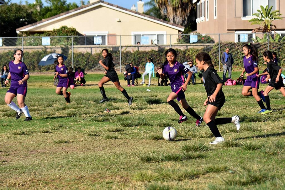 Constantly applying pressure, California United’s Tori Pina sprints up the field as her teammate Jadon Rodriguez (back left) keeps pace looking for a chance to score. Photo Courtesy of Evelia Hernandez.