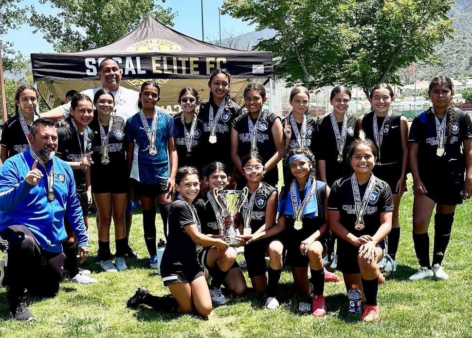 Pictured is Fillmore’s California United FC 2013 Girls Team. Top Row: Christine Beltran, Sarai Prado, Siani Lomeli, Assistant Coach Tony Mendez, Miley Morales, Aaliyah Cervantez, Bella Mendez, Sadie Manriquez, Hanna Sasson, Maddie Adam, Eve Arroyo, and Kenya Hernandez. Bottom Row: Head Coach Jose Luis Lomeli, Aixa Lomeli, Toni Cervantez, Mariannah Arreola, Itzel Arana, and Alessandra Padilla. Photo credit Erika Arana. 