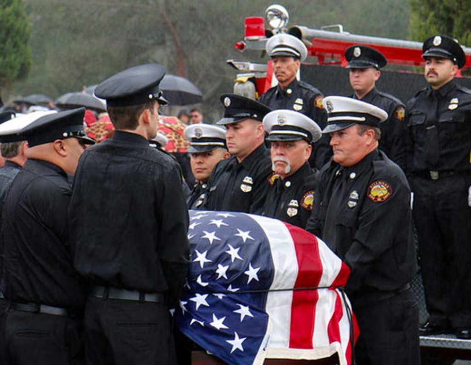 Chief Landeros’ fellow firefighters carry him to his final rest. Photos courtesy Sebastian Ramirez.