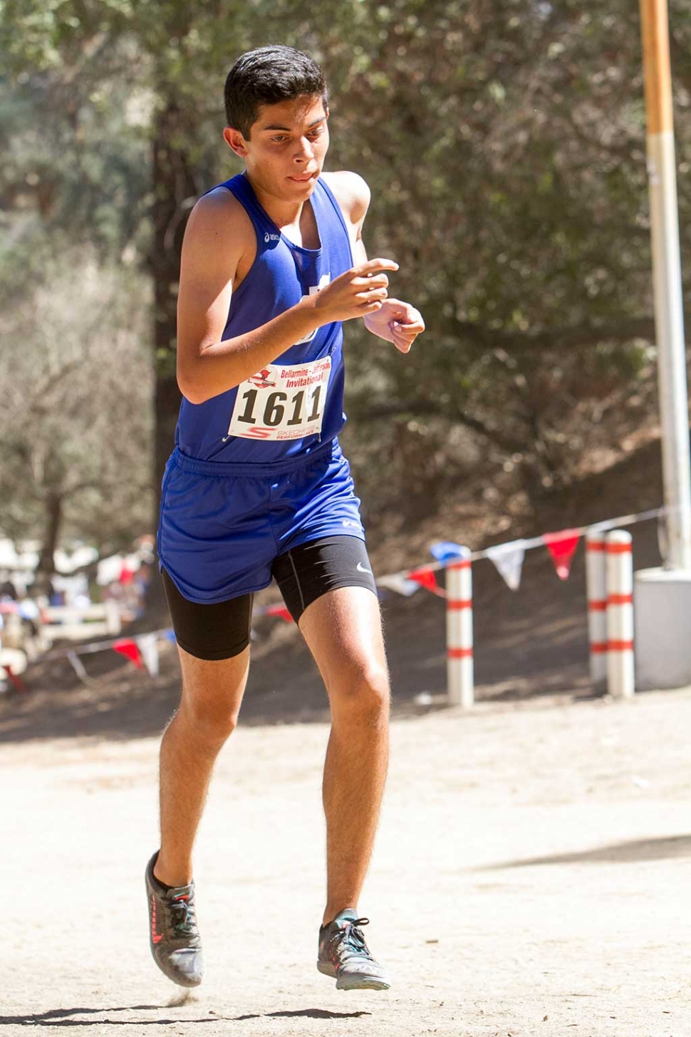 Flashes Cross Country’s Christian Andrade wins the boys junior varsity race at the Bellamarine Jefferson Invitational.