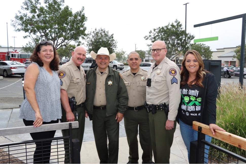 On Tuesday, May 16, the Fillmore Police and Fire Departments held “Coffee with the
Badges” in support of the First Responders for Mental Health Awareness Initiative.
Pictured (l-r) are Fillmore Council Member Christina Villasenor, Sergeant Will Hollowell,
Assistant Sheriff Jose Rivera, Captain Eduardo Malagon, Sergeant Meixner, and Maya
Zumaya. Photo credit Angel Esquivel-AE News