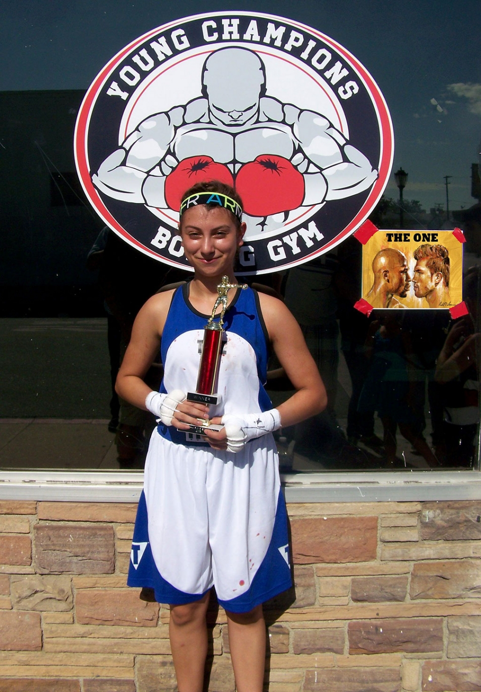 The Fillmore Boxing Club's Demily Amezcua recently competed in San Fernando, CA in the 100 lb. weight class. She was victorious in her debut match winning via decision vs. Kayline Marez of the Young Champions Boxing Club. The bout was three rounds of one and a half minute duration. Amezcua was able to establish a jab that was the difference maker in the first two rounds of the bout and was able to fight off her persistent opponent's attacks in the final round.