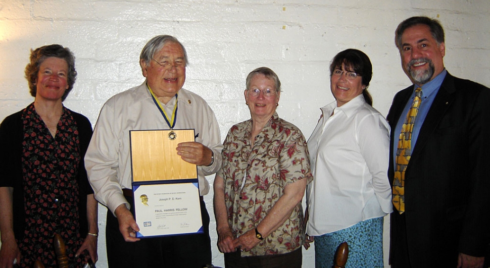 Joseph Kern accepting the Paul Harris Award.