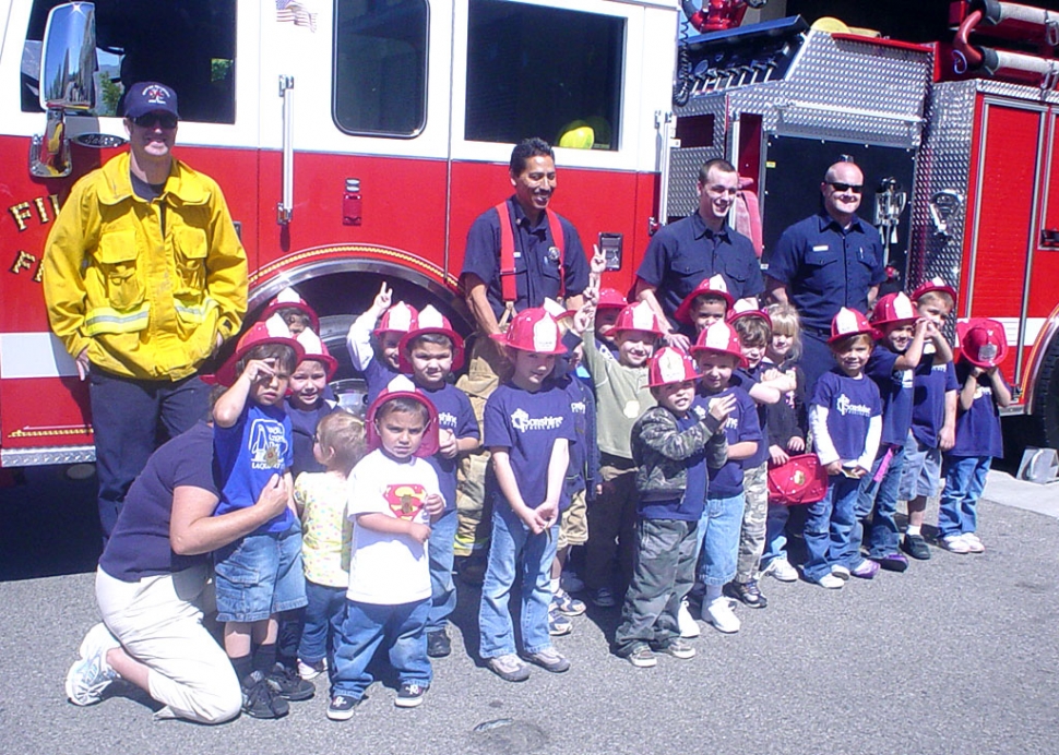 Sonshine Preschool students made a trip to the Fillmore Fire station last week. They got to climb the fireman’s pole and squirt the hose, all while wearing shiny fireman’s hats. Here the kids are in front of the fire engine. The class was led by Mrs. Kemp, Ms. Kemp and Mrs. Nunes.