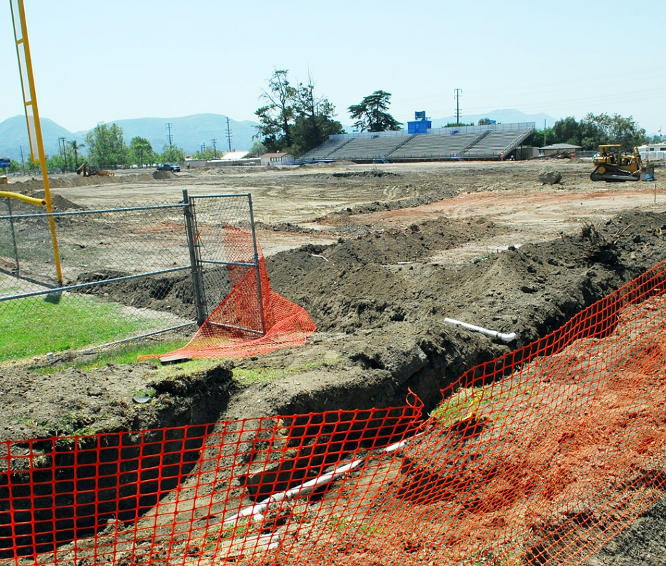 The Fillmore High School bleachers can be seen in the distant background. The football field is being prepared to receive water lines from our new water treatment plant. Every effort is being made to complete the project before graduation. The outcome, however, is uncertain.