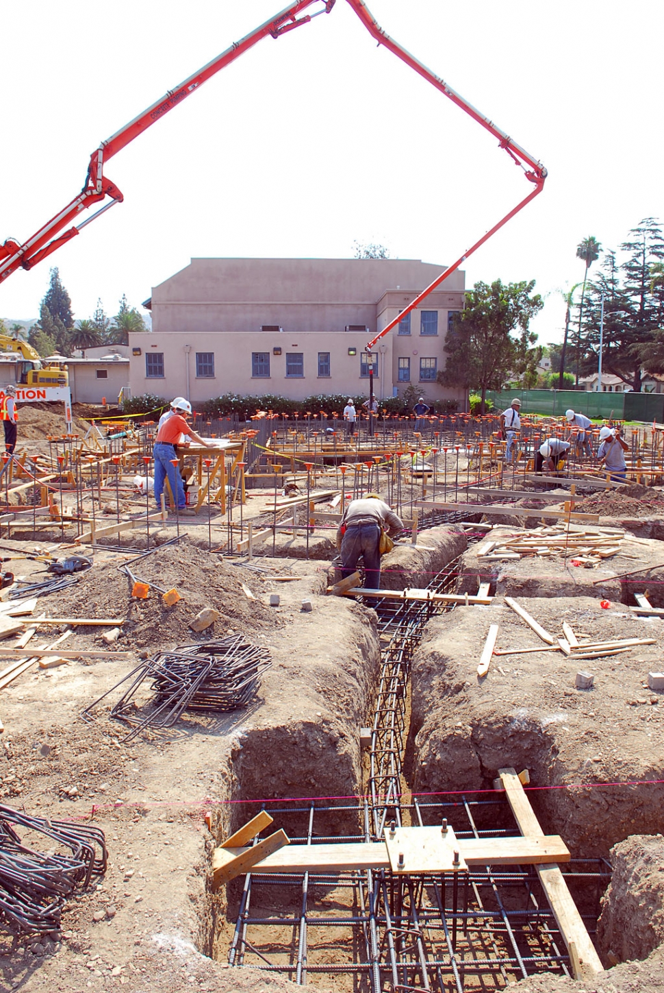 Foundations for the swimming pool complex were poured this week. The pool and tennis courts are expected to be open for business around the end of the year.