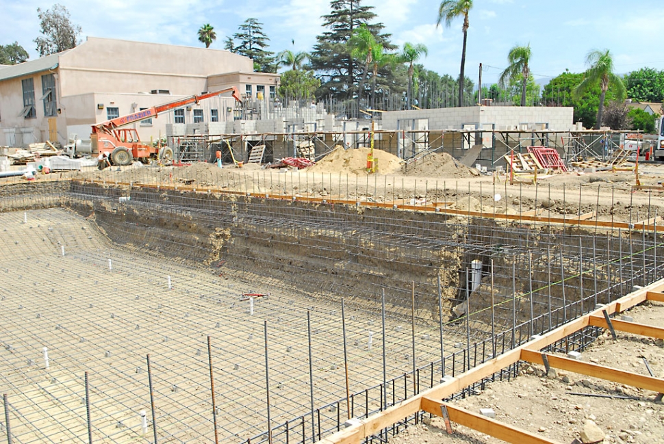 This photo was taken shortly before the pool's floor was poured. A heavy re-bar grid-work is in place to receive the concrete.