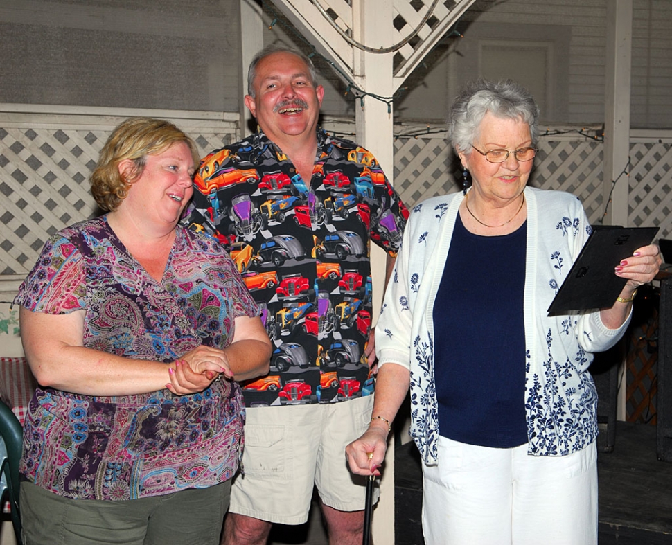 Mama Sue Conroy and Ken Talent present Mrs. Chaney a plaque for her hard work and dedication for Grad Nite Live during the spaghetti dinner held Friday night. The dinner was successful and made close to $1300. Talent also presented a check from Search and Rescue in the amount of $500 to Grad Nite Live.