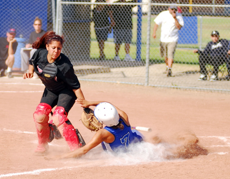 Tenea Golson tried to steal home on a base hit, but was tagged out on the throw to home.