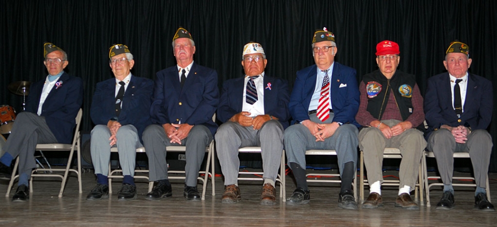 Fillmore’s war heroes honored at Middle School’s Pride in America Day. From left, Richard Schuck, Bud Untiedt, Victor Westerberg, William Preciado, J. C. Woods, Wendell Tilley, and John Pressey. This year’s program was attended by a disciplined and respectful student audience, and especially dedicated to Staff Sergeant Felix Gabriel Chavez, U.S. Army, who is recovering from severe injuries suffered by an improvised explosive device (IED) while fighting in Iraq. A special slide presentation was shown, with a thank you message from Gabriel Chavez.