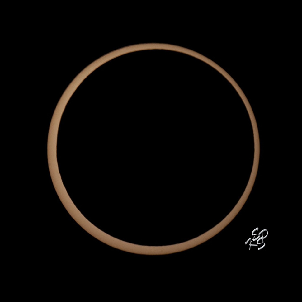 This last image is at the maximum eclipse. The annular portion is not circular because we were south of the eclipse's centerline. If you look carefully you can see that the moon's limb is not smooth. There are mountains and valleys.