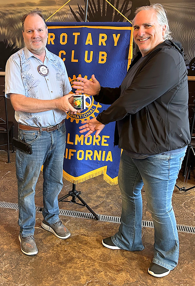 Pictured is Fillmore Rotary President Scott Beylik and speaker Eric Swenson. Photo credit Martha Richardson.