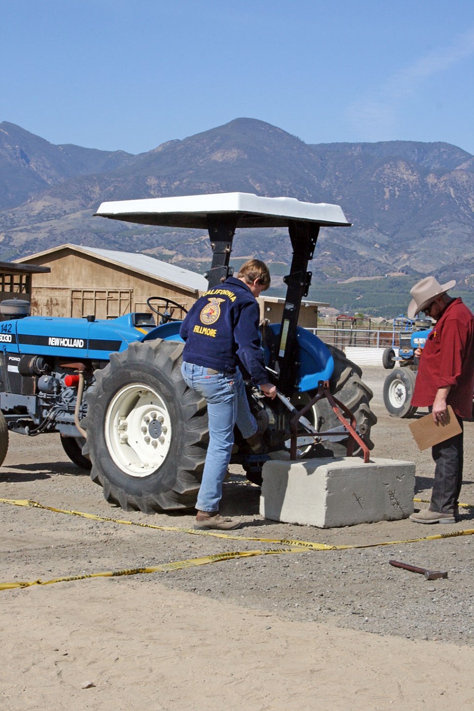 Fillmore FFA student Timmy Klittich competing in the three point hitch tractor contest.