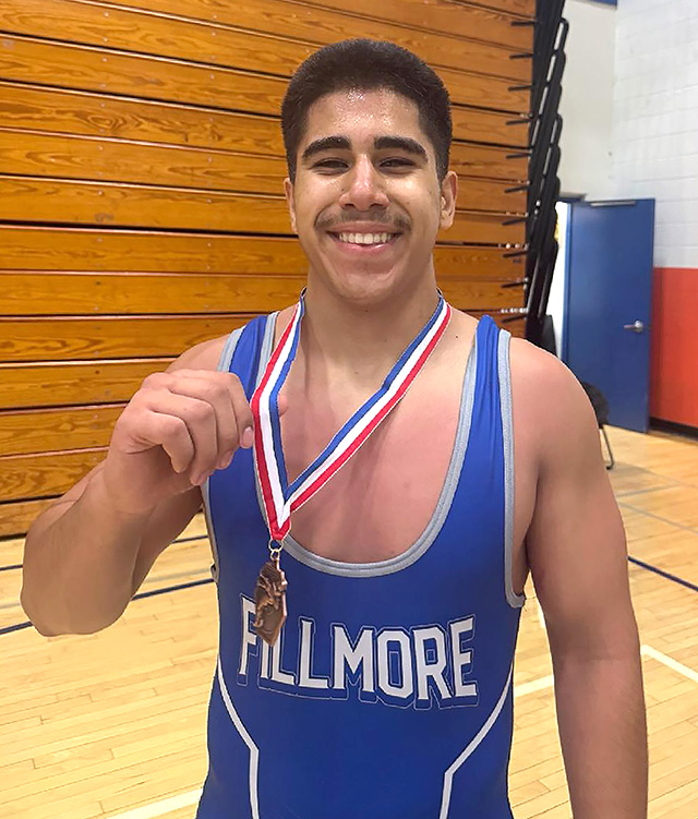 Flashes Gonzalo Landeros who placed 3rd in the tournament. Photo credit Boys Wrestling Head Coach Manuel Ponce. 