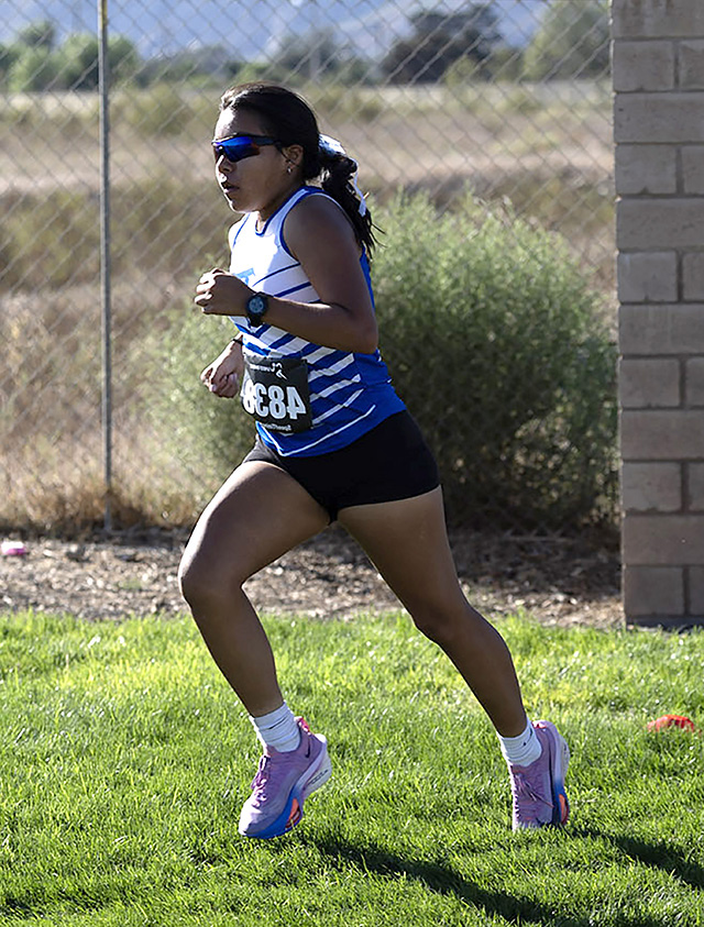 FHS runner Camila Rodriguez competes in the Girl’s Varsity race, which she won with an impressive time of 18:39.1. The team placed second as a team. Photo credit Coach Anthony Chavez. 