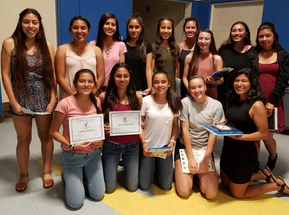 Fillmore High School Girls Soccer Team smile for a photo during their end of the year banquet, where they celebrated placing in their league this season.